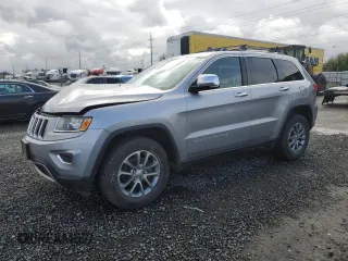 2014 Jeep Grand Cherokee Limited z VIN 1C4RJFBG4EC510097, wystawiony jako Copart lot #50753195 z przebiegiem 178 576 mil mil oraz Szkoda całkowita • Salvage title. Historia ofert i sprzedaży dostępna na DreamBid. Obrazek 1.