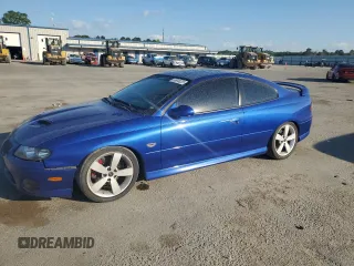 2006 Pontiac GTO z VIN 6G2VX12U66L516949, wystawiony jako Copart lot #55618225 z przebiegiem 77 371 mil mil oraz Tytuł czysty. Historia ofert i sprzedaży dostępna na DreamBid. Obrazek 1.