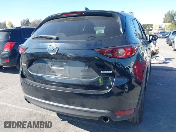 2017 Mazda CX-5 Touring with VIN JM3KFACL2H0146213, listed as a IAAI auction lot 41626112 with 77,829 mi miles and . Bid and sale history available at carsss.com. Image 4.