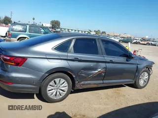 2019 Volkswagen Jetta S with VIN 3VWC57BU9KM093282, listed as a IAAI auction lot 42604217 with 91,847 mi miles and . Bid and sale history available at DreamBid. Image 14.