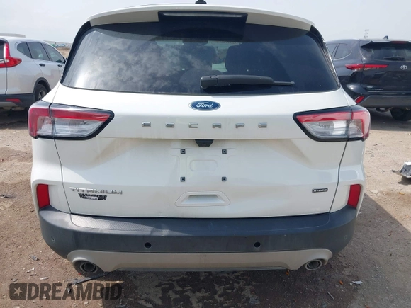 2020 Ford Escape Titanium Hybrid with VIN 1FMCU0DZ9LUA54867, listed as a IAAI auction lot 42268245 with 68,974 mi miles and . Bid and sale history available at DreamBid. Image 16.