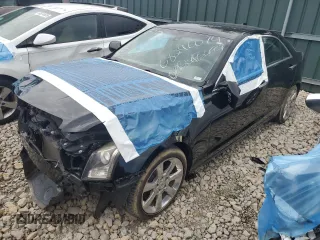2015 Cadillac ATS Standard RWD with VIN 1G6AA5RX6F0133629, listed as a Copart auction lot 68246074 with 72,916 mi miles and Salvage title. Bid and sale history available at DreamBid. Image 1.