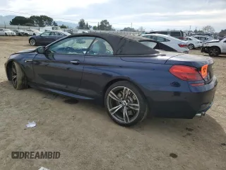 2016 BMW M6 z VIN WBS6G9C5XGD932039, wystawiony jako Copart lot #47433685 z przebiegiem 66 836 mil mil oraz Szkoda całkowita • Salvage title. Historia ofert i sprzedaży dostępna na DreamBid. Obrazek 2.