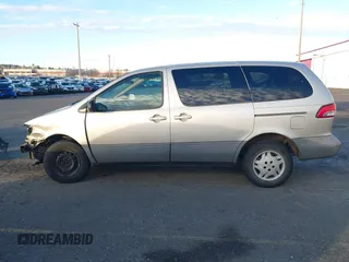 2001 Toyota Sienna CE with VIN 4T3ZF19C31U370820, listed as a IAAI auction lot 41244099 with 166,674 mi miles. Bid and sale history available at carsss.com. Image 15.