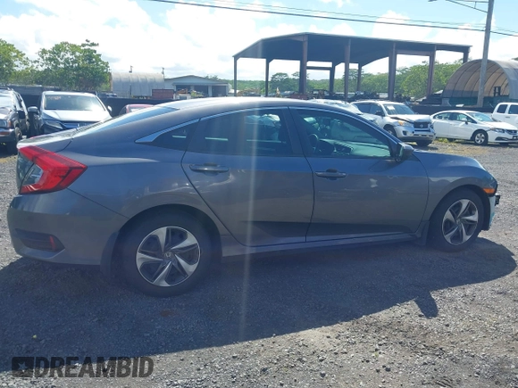 2020 Honda Civic LX z VIN 19XFC2F67LE001375, wystawiony jako IAAI lot #42033879 z przebiegiem 79 941 mil mil oraz . Historia ofert i sprzedaży dostępna na DreamBid. Obrazek 14.