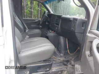 2014 Chevrolet Express Cargo with VIN 1GCWGFBA1E1210672, listed as a IAAI auction lot 42184397 with 174,364 mi miles and . Bid and sale history available at DreamBid. Image 5.