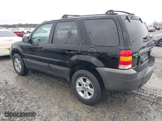 2005 Ford Escape XLT with VIN 1FMYU03155KD75479, listed as a IAAI auction lot 41757864 with 213,571 mi miles. Bid and sale history available at carsss.com. Image 3.