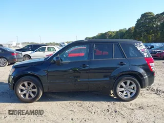 2011 Suzuki Grand Vitara Limited z VIN JS3TE0D72B4100152, wystawiony jako IAAI lot #40676416 z przebiegiem 193 097 mil mil oraz . Historia ofert i sprzedaży dostępna na DreamBid. Obrazek 14.