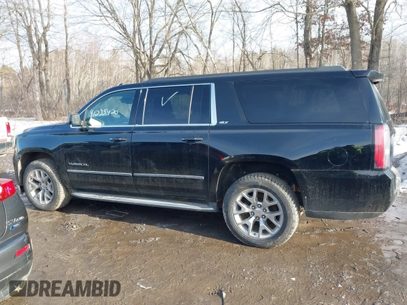 2015 GMC Yukon XL SLT with VIN 1GKS2HKC9FR159164, listed as a IAAI auction lot 41708822 with 136,730 mi miles. Bid and sale history available at carsss.com. Image 14.