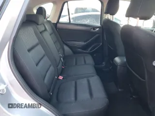 2014 Mazda CX-5 Touring with VIN JM3KE2CY8E0305641, listed as a Copart auction lot 42617165 with 107,336 mi miles and Salvage Title. Bid and sale history available at carsss.com. Image 11.