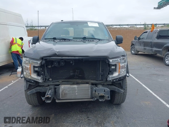 2018 Ford F-150 XL z VIN 1FTEW1CP1JKF15209, wystawiony jako IAAI lot #42048362 z przebiegiem 95 882 mil mil oraz . Historia ofert i sprzedaży dostępna na DreamBid. Obrazek 12.