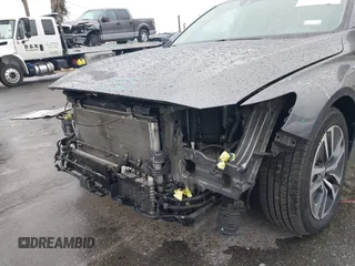 2020 Honda Accord with VIN 1HGCV3F13LA015933, listed as a IAAI auction lot 41720543 with 64,943 mi miles and . Bid and sale history available at DreamBid. Image 6.