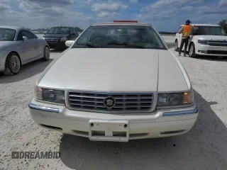 2002 Cadillac Eldorado z VIN 1G6EL12Y32B102263, wystawiony jako Copart lot #77108634 z przebiegiem 43 162 mil mil oraz Nie do naprawy • Non repairable. Historia ofert i sprzedaży dostępna na DreamBid. Obrazek 5.