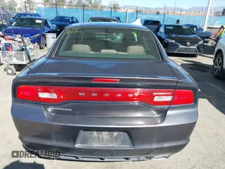 2013 Dodge Charger SE with VIN 2C3CDXBGXDH688230, listed as a IAAI auction lot 41634325 with 133,519 mi miles. Bid and sale history available at carsss.com. Image 16.