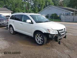 2013 Dodge Journey Crew with VIN 3C4PDCDG0DT591533, listed as a IAAI auction lot 42630548 with 164,961 mi miles and . Bid and sale history available at DreamBid. Image 1.