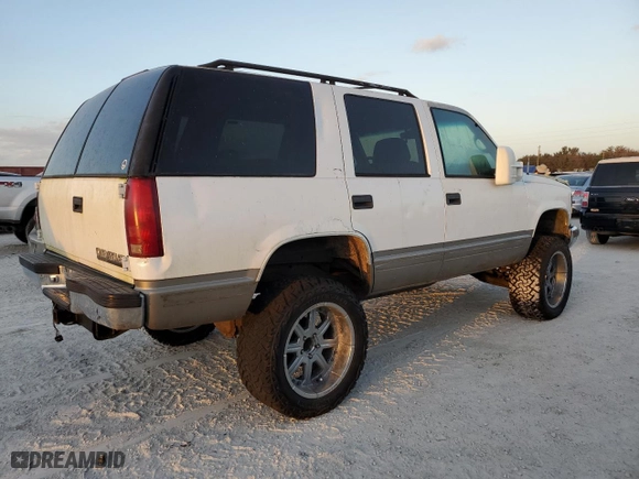 1999 Chevrolet Tahoe with VIN 1GNEC13R2XJ556769, listed as a Copart auction lot 77561624 with 205,238 mi miles and Non Repairable. Bid and sale history available at carsss.com. Image 3.