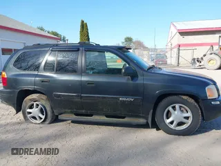 2005 GMC Envoy SLE z VIN 1GKDT13S852116252, wystawiony jako IAAI lot #42086929 z przebiegiem Nie podano mil oraz . Historia ofert i sprzedaży dostępna na DreamBid. Obrazek 14.
