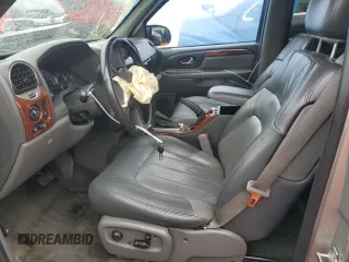 2004 GMC Envoy SLE with VIN 1GKDS13S142358446, listed as a Copart auction lot 43383935 with 154,358 mi miles and Salvage Title. Bid and sale history available at carsss.com. Image 7.