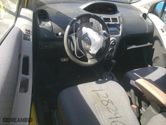 2009 Toyota Yaris with VIN JTDJT903895227558, listed as a Copart auction lot 46853025 with 128,246 mi miles and Salvage Title. Bid and sale history available at carsss.com. Image 8.