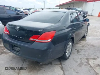 2007 Toyota Avalon XL with VIN 4T1BK36B17U233817, listed as a IAAI auction lot 41916994 with 168,923 mi miles and . Bid and sale history available at DreamBid. Image 4.