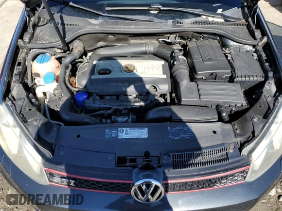 2010 Volkswagen GTI z VIN WVWFD7AJ2AW373022, wystawiony jako Copart lot #49448755 z przebiegiem 66 983 mil mil oraz Szkoda całkowita • Salvage title. Historia ofert i sprzedaży dostępna na DreamBid. Obrazek 11.
