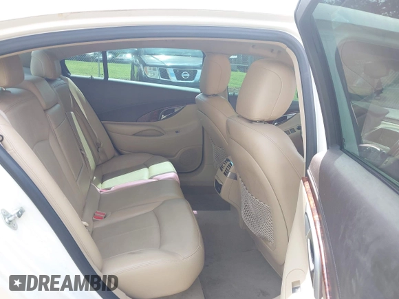 2013 Buick LaCrosse Premium 1 with VIN 1G4GF5E35DF318661, listed as a IAAI auction lot 42757734 with 259,103 mi miles and . Bid and sale history available at DreamBid. Image 8.