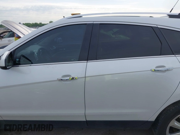 2013 Cadillac SRX Premium Collection with VIN 3GYFNEE36DS508381, listed as a IAAI auction lot 42164119 with 85,810 mi miles and . Bid and sale history available at DreamBid. Image 15.