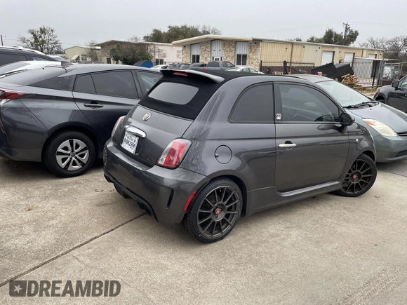 2014 FIAT 500 Abarth with VIN 3C3CFFJH8ET190132, listed as a IAAI auction lot 41574469 with 105,809 mi miles. Bid and sale history available at carsss.com. Image 4.