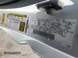2014 Toyota Tacoma z VIN 5TFNX4CN6EX037942, wystawiony jako Copart lot #51158405 z przebiegiem 157 825 mil mil oraz Szkoda całkowita • Salvage title. Historia ofert i sprzedaży dostępna na DreamBid. Obrazek 14.