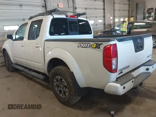 2014 Nissan Frontier SV with VIN 1N6AD0EV4EN736220, listed as a IAAI auction lot 41241823 with 91,789 mi miles and . Bid and sale history available at DreamBid. Image 3.