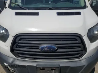2015 Ford Transit Cargo z VIN 1FTNR1ZM1FKB05215, wystawiony jako Copart lot #62349495 z przebiegiem 154 057 mil mil oraz Czysty tytuł • Clean title. Historia ofert i sprzedaży dostępna na DreamBid. Obrazek 11.
