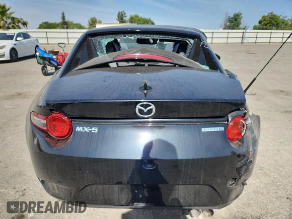 2022 Mazda MX-5 Miata Grand Touring z VIN JM1NDAM77N0503295, wystawiony jako Copart lot #58703795 z przebiegiem 14 237 mil mil oraz Szkoda całkowita • Salvage title. Historia ofert i sprzedaży dostępna na DreamBid. Obrazek 6.