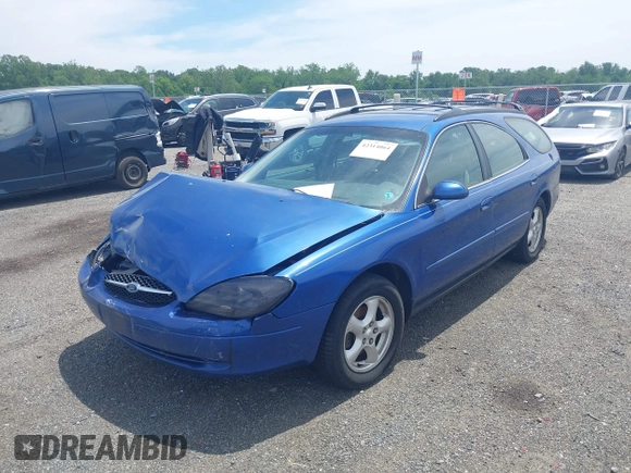 2003 Ford Taurus SE Standard z VIN 1FAFP58U93A171652, wystawiony jako IAAI lot #42314064 z przebiegiem 116 697 mil mil oraz . Historia ofert i sprzedaży dostępna na DreamBid. Obrazek 2.