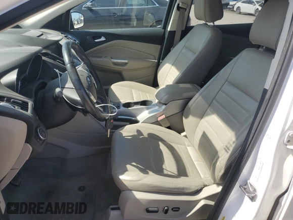 2013 Ford Escape SEL z VIN 1FMCU9H94DUC68911, wystawiony jako Copart lot #61671155 z przebiegiem 165 985 mil mil oraz Szkoda całkowita • Salvage title. Historia ofert i sprzedaży dostępna na DreamBid. Obrazek 7.