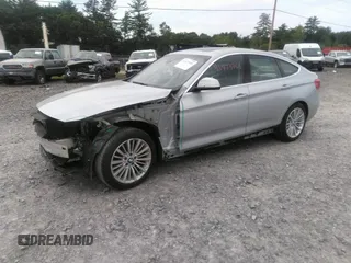 2014 BMW 3 Series 328i Gran Turismo xDrive z VIN WBA3X5C58ED558625, wystawiony jako IAAI lot #42473401 z przebiegiem 106 419 mil mil oraz . Historia ofert i sprzedaży dostępna na DreamBid. Obrazek 2.