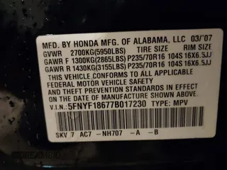 2007 Honda Pilot EX-L with VIN 5FNYF18677B017230, listed as a IAAI auction lot 41727853 with 257,527 mi miles and . Bid and sale history available at DreamBid. Image 9.