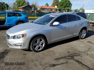 2014 Volvo S60 T5 z VIN YV1612FS0E1292871, wystawiony jako Copart lot #60105755 z przebiegiem 122 279 mil mil oraz Czysty tytuł • Clean title. Historia ofert i sprzedaży dostępna na DreamBid. Obrazek 1.