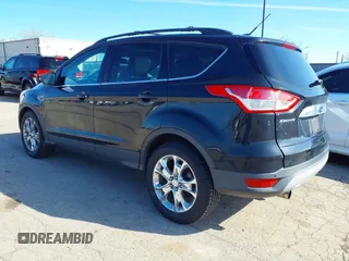 2013 Ford Escape SEL with VIN 1FMCU9HX1DUA20307, listed as a IAAI auction lot 41933873 with 164,962 mi miles. Bid and sale history available at carsss.com. Image 3.