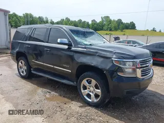 2016 Chevrolet Tahoe LT with VIN 1GNSKBKC2GR140991, listed as a IAAI auction lot 42469765 with 240,809 mi miles and . Bid and sale history available at DreamBid. Image 1.