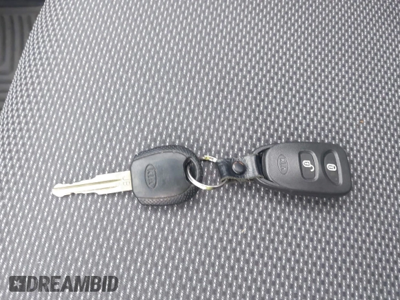 2009 Kia Rio LX with VIN KNADE243596544181, listed as a IAAI auction lot 41876733 with 200,216 mi miles. Bid and sale history available at carsss.com. Image 11.