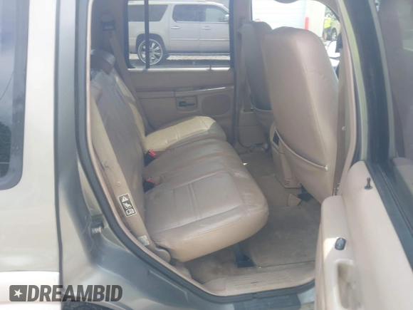 2001 Ford Explorer Eddie Bauer z VIN 1FMDU84PX1ZA24486, wystawiony jako IAAI lot #42533270 z przebiegiem 152 550 mil mil oraz . Historia ofert i sprzedaży dostępna na DreamBid. Obrazek 8.