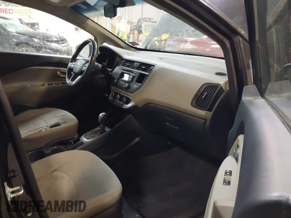 2014 Kia Rio LX with VIN KNADM4A31E6404206, listed as a IAAI auction lot 41543090 with 70,563 mi miles and . Bid and sale history available at DreamBid. Image 5.