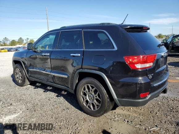 2013 Jeep Grand Cherokee Overland with VIN 1C4RJFCG2DC653207, listed as a Copart auction lot 48680885 with 276,020 mi miles and Salvage Title. Bid and sale history available at carsss.com. Image 2.