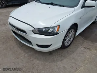 2012 Mitsubishi Lancer ES with VIN JA32U2FU5CU029556, listed as a IAAI auction lot 42104297 with 111,821 mi miles. Bid and sale history available at carsss.com. Image 2.