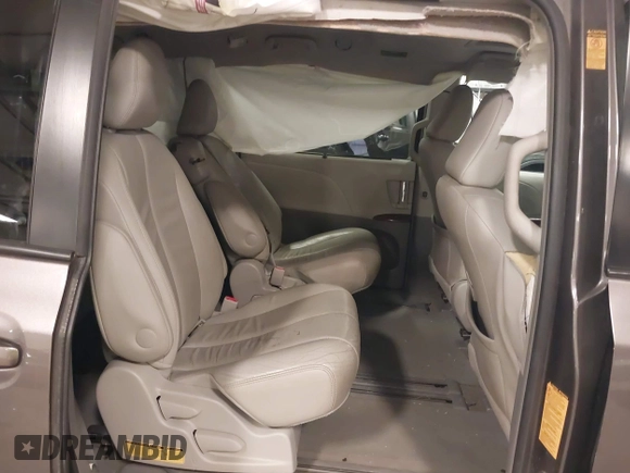 2013 Toyota Sienna XLE AAS z VIN 5TDYK3DC6DS386235, wystawiony jako IAAI lot #42191706 z przebiegiem 144 328 mil mil oraz . Historia ofert i sprzedaży dostępna na DreamBid. Obrazek 8.