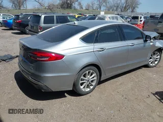 2020 Ford Fusion SE z VIN 3FA6P0HD9LR231471, wystawiony jako IAAI lot #41986473 z przebiegiem 58 587 mil mil oraz . Historia ofert i sprzedaży dostępna na DreamBid. Obrazek 4.