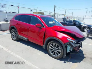2020 Mazda CX-9 Signature with VIN JM3TCBEY7L0406190, listed as a IAAI auction lot 42397660 with 55,007 mi miles and . Bid and sale history available at DreamBid. Image 1.