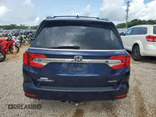 2019 Honda Odyssey Touring z VIN 5FNRL6H8XKB027156, wystawiony jako Copart lot #60735455 z przebiegiem 100 044 mil mil oraz Szkoda całkowita • Salvage title. Historia ofert i sprzedaży dostępna na DreamBid. Obrazek 6.