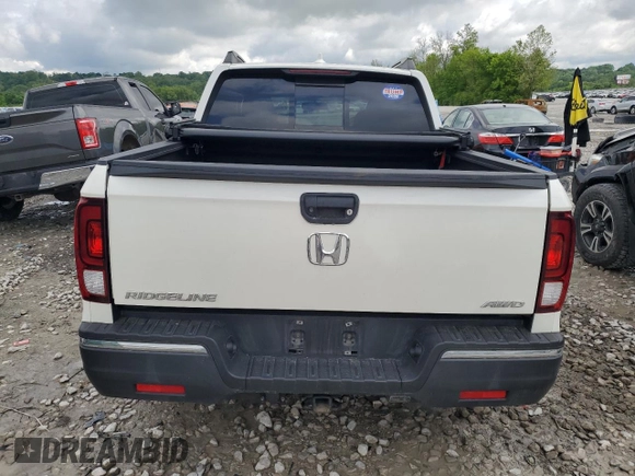 2019 Honda Ridgeline RTL-T with VIN 5FPYK3F67KB027766, listed as a Copart auction lot 56746515 with 66,948 mi miles and Salvage title. Bid and sale history available at DreamBid. Image 6.