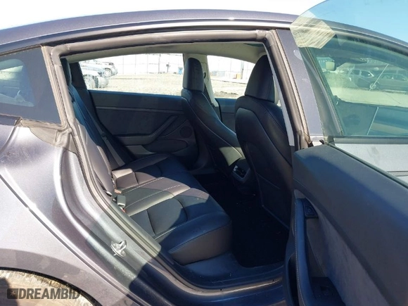 2023 Tesla Model 3 with VIN 5YJ3E1EA0PF485869, listed as a IAAI auction lot 41763996 with 17,092 mi miles. Bid and sale history available at carsss.com. Image 8.